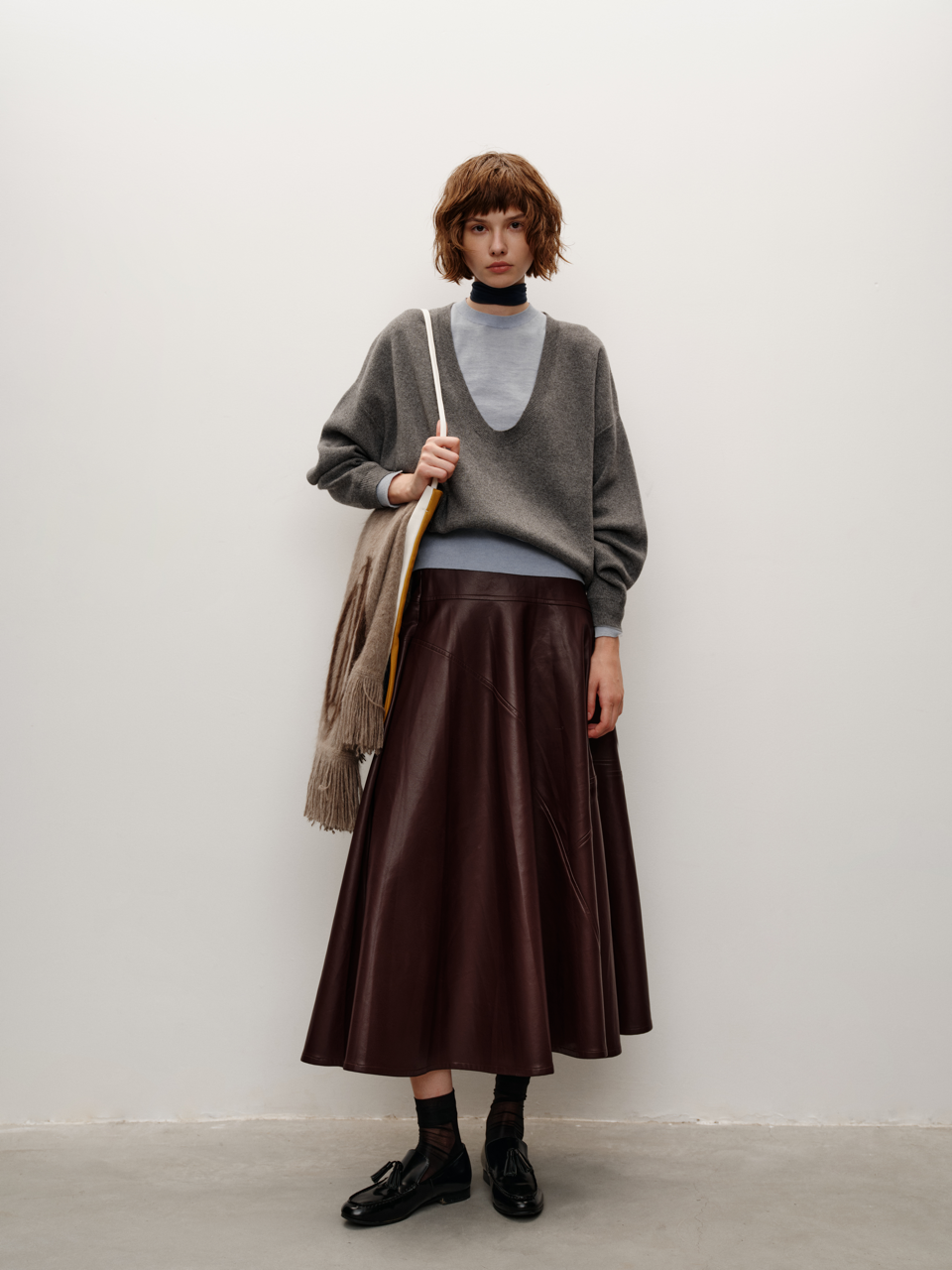 Sustainable Eco Leather with Asymmetric Paneled Midi A Line Skirt