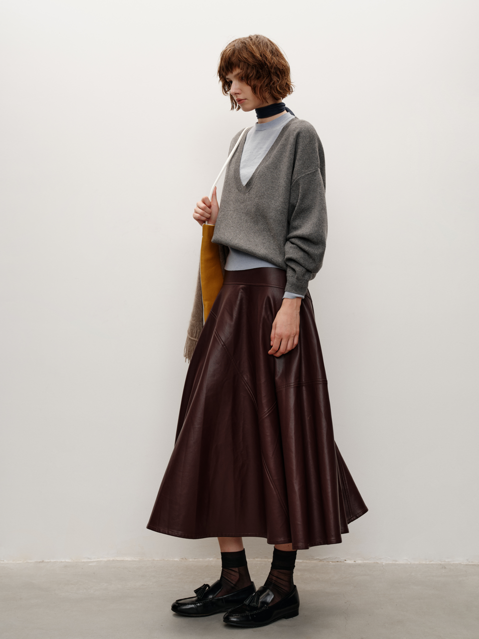 Sustainable Eco Leather with Asymmetric Paneled Midi A Line Skirt